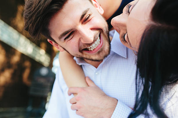 istock Woman Embracing Her Boyfriend From Behind 486780700