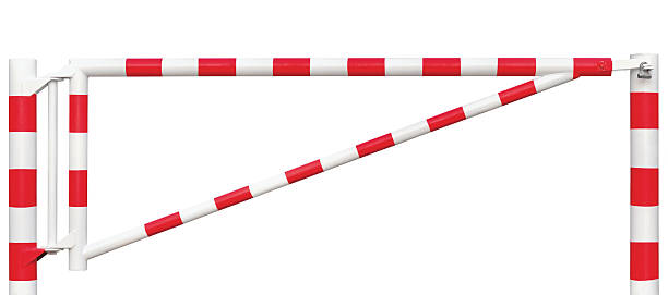 istock Gated Road Barrier Closeup, Roadway Gate Bar Bright White Red 486781162