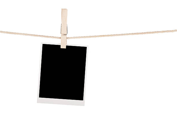 istock Blank photo hanging on clothesline 486781594