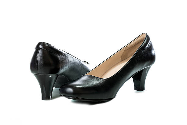 istock Women's black high heel shoes isolated on a white background 486782486
