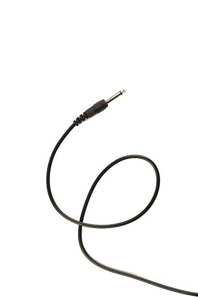 istock Guitar audio jack with black cable isolated on white background 486783766