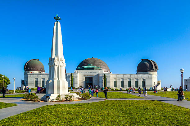 people visit the Griffith observatory Los Angeles, USA- June 10, 2012:  people visit the Griffith observatory in Griffith park  in Los Angeles. Due to Grifiths last will the entrance for public is free since 1935. griffith park observatory stock pictures, royalty-free photos & images
