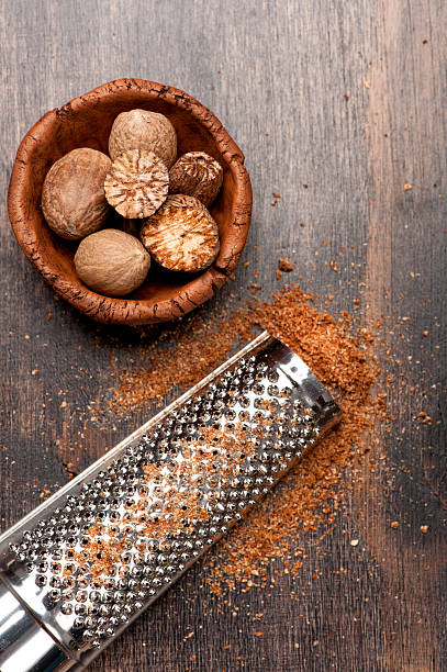 Nutmegs grated Nutmegs grated nutmeg stock pictures, royalty-free photos & images