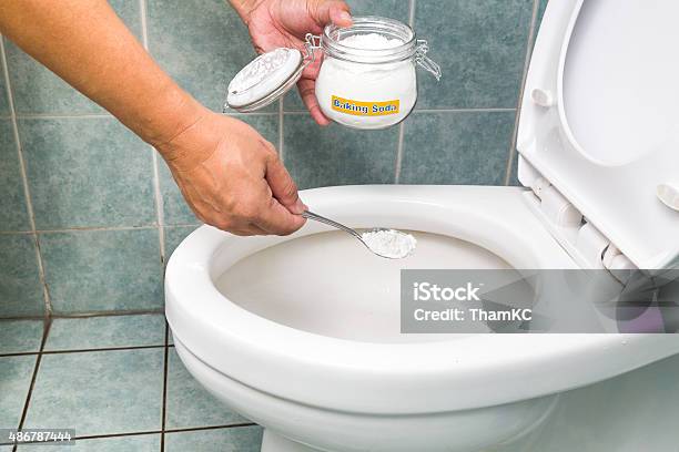 Baking Soda To Clean And Disinfect Bathroom And Toilet Bowl Stock Photo - Download Image Now