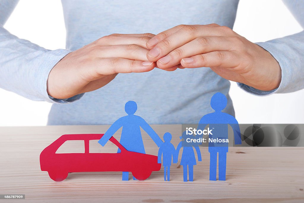 Hands Guarding Family and Car Hands Guarding a Family with their Car, Isolated Aspirations Stock Photo
