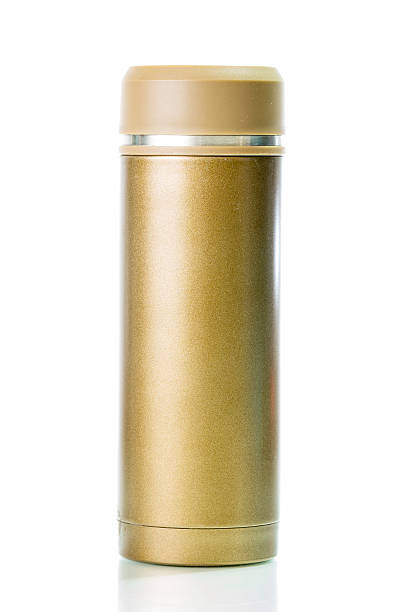 istock Gold metal thermos isolated on white background 486788088