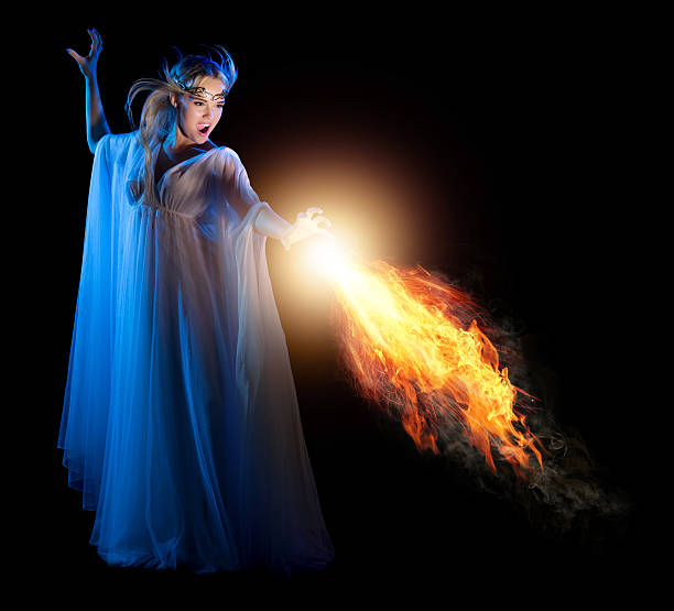 istock Young elven girl with fire isolated 486789988