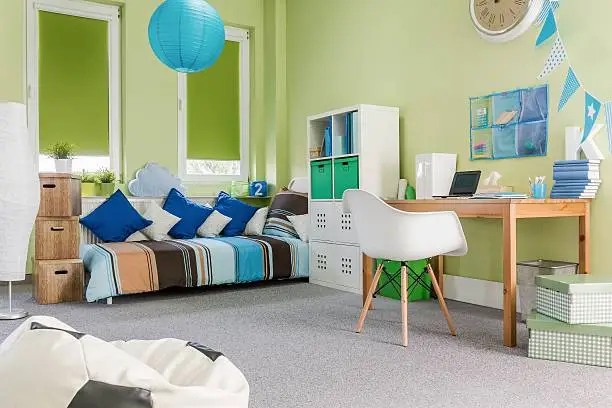 Photo of spacious modern design green boy room