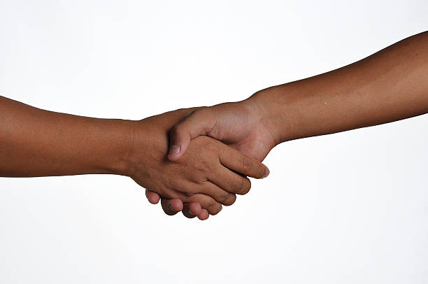 istock The handshake of a mother and son. 486791000