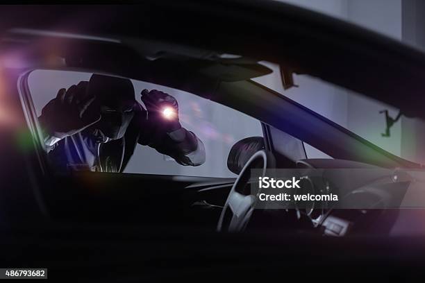 Car Robber With Flashlight Stock Photo - Download Image Now - Car, Stealing - Crime, Thief