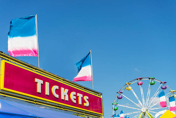 istock Buy Tickets Here, Carnival or Fair with Ferris Wheel 486796226