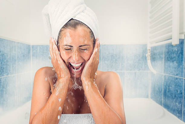 istock Young Woman Washing The Face 486796752