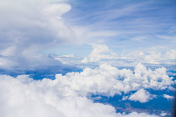 istock View from plane on the clounds blue sky 486796816