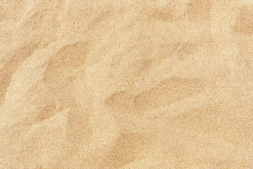 Playa de fina arena en el sol de verano photo