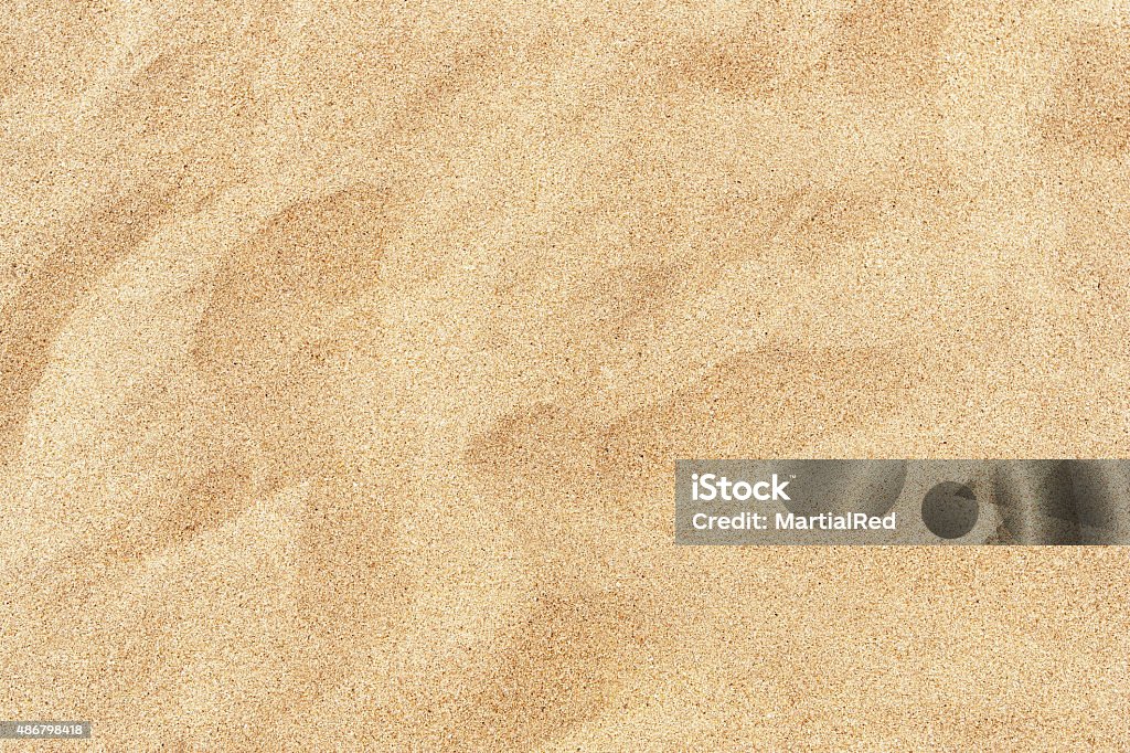 Fine beach sand in the summer sun A beach background with fine sand Sand Stock Photo