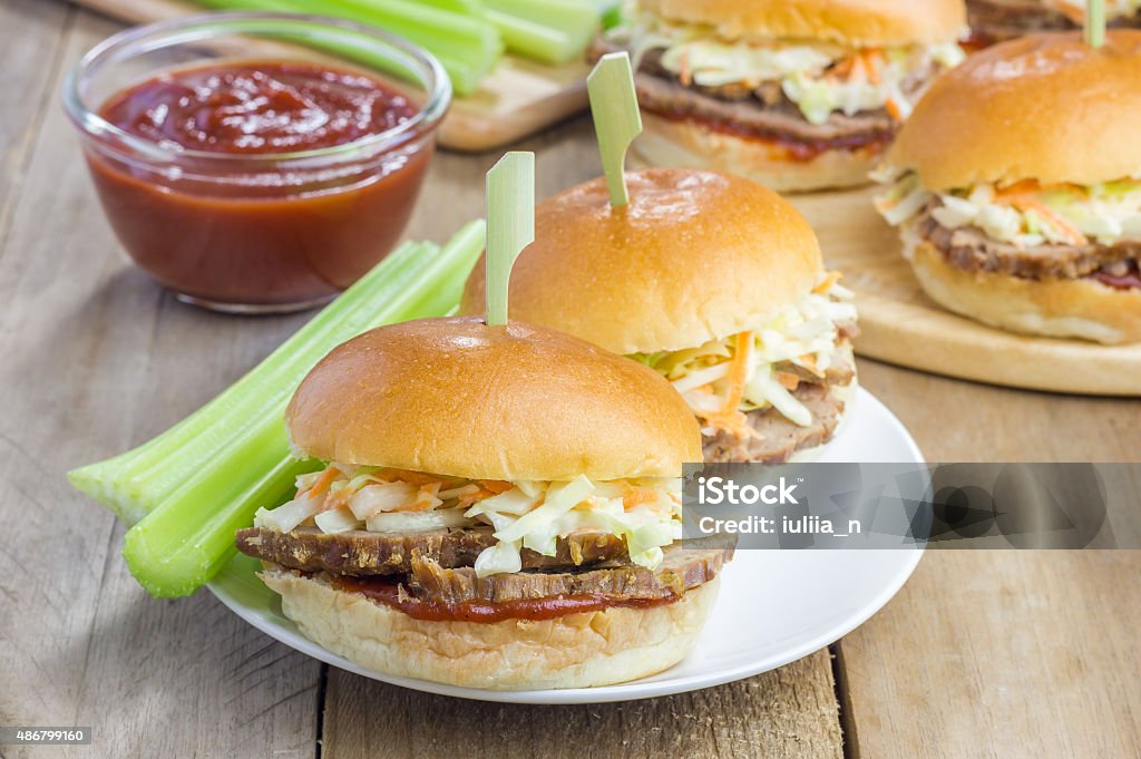 Sliders with beef brisket, barbecue sauce and coleslaw Brisket Stock Photo