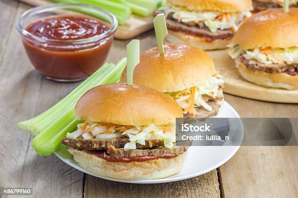 Sliders With Beef Brisket Barbecue Sauce And Coleslaw Stock Photo - Download Image Now