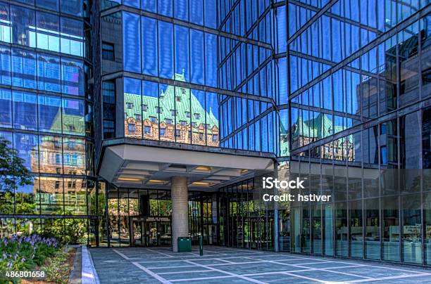 Parliament Reflected In Bank Of Canada Building Ottawa Stock Photo - Download Image Now