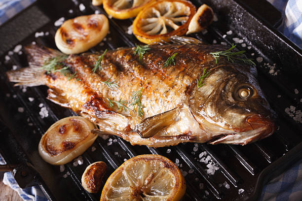 Grilled Fish, Mackerel, on Charcoal Grill.