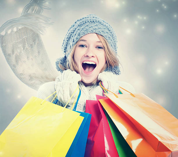 istock Happy Young Woman with Shopping Bag 486805678