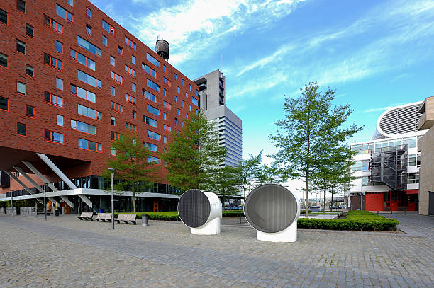 The Wierdsmaplein (Wiersdma square) with its characteristic ventilation shafts is a small square with park on the Kop van Zuid in Rotterdam next to the high-rise building Montevideo, the arthouse LantarenVenster and the cruise terminal.