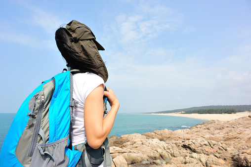 fitness woman hiker enjoy the vew at seaside, summer holidays