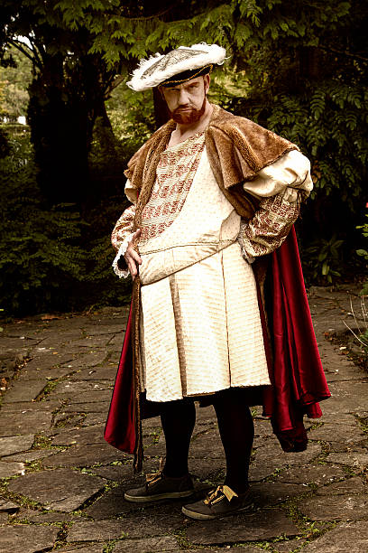 istock Man in costume posing in garden 486806956