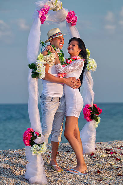 istock Newlywed couple in Hawaiian Hula 486807627