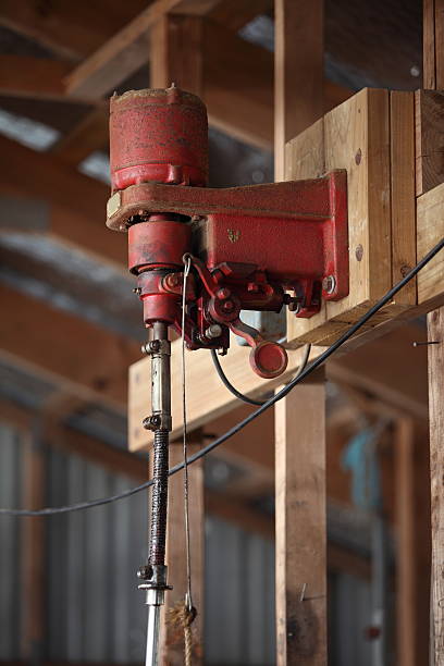 Shearing machine in a sheep shearing shed stock photo