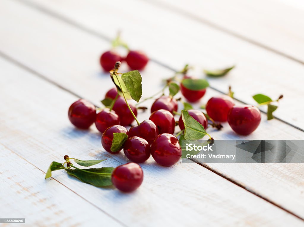 cherries fresh cherries on wooden table Backgrounds Stock Photo