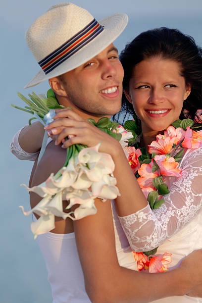 istock Newlywed couple in Hawaiian Hula 486808815