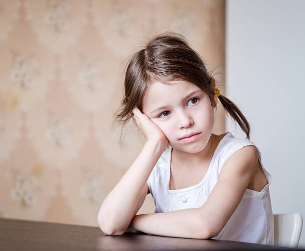 istock Dissatisfied preschooler girl in the kitchen 486809733