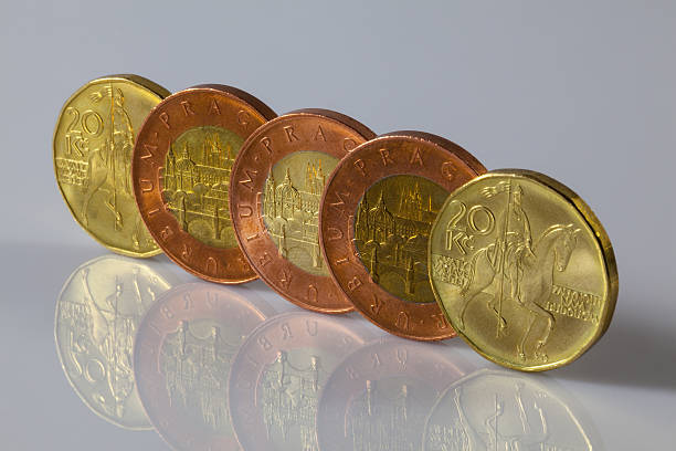 istock Czech coins standing on the glass table 486811435