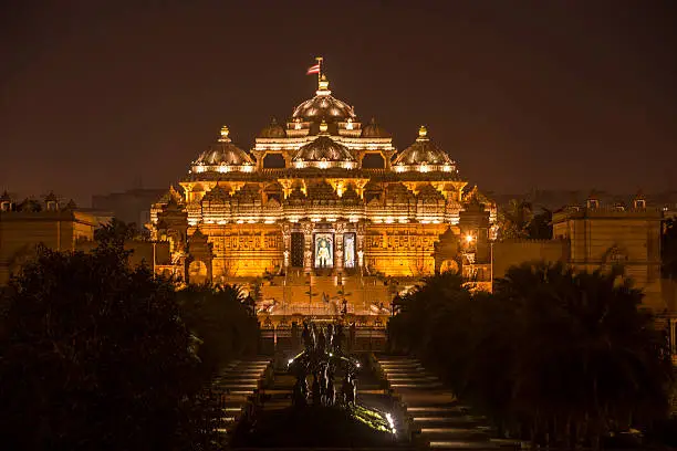 Akshardham or Swaminarayan Akshardham complex, illuminated with lights at night. It is a Hindu temple, and a spiritual-cultural campus in New Delhi, India.