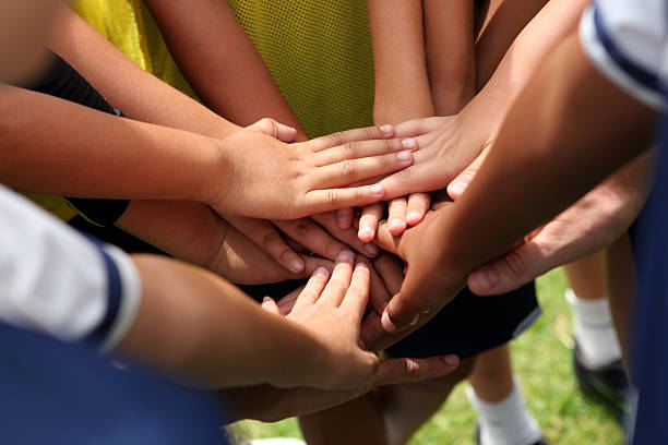 istock group of young people's hands 486811599