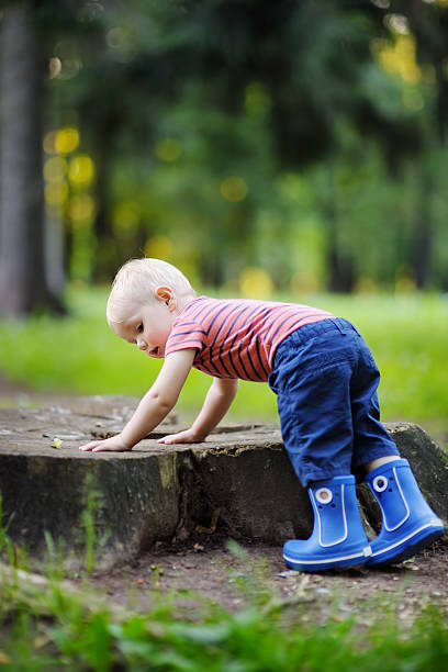 istock Toddler playing outdoors 486811962
