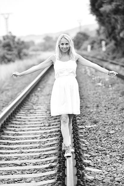 istock beautiful pregnant girl on a railway 486812204