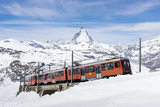 Zermatt, Switzerland The train running to the  station with clear view to Matterhorn.