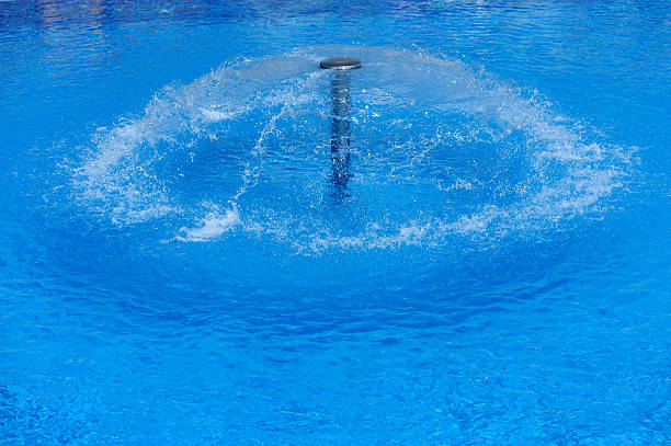 istock Swimming pool with fountain 486813918
