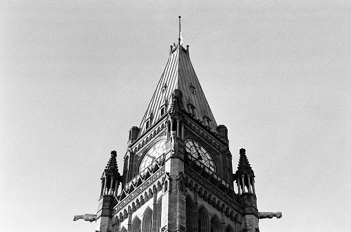 A photograph of the Centre Block Peace Tower located on Parliament Hill, Ottawa, Canada.
