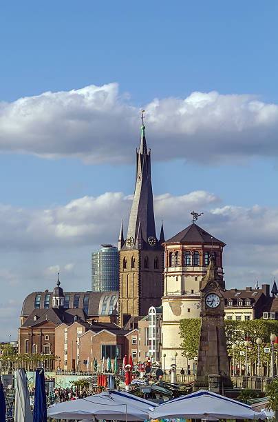 view of Dusseldorf historic center with Old Castle Tower and st lambertus church, Germany