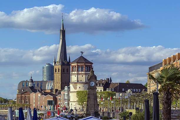 view of Dusseldorf historic center with Old Castle Tower and st lambertus church, Germany