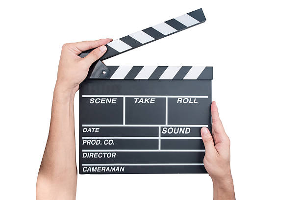 istock Man holding movie production clapper board 486818792