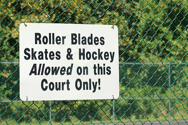 istock Roller Blades Skates Hockey Allowed on this court only sign 486820640