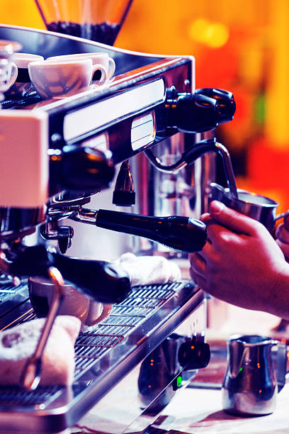 istock Barista preparing coffee on espresso machine in bar 486822038
