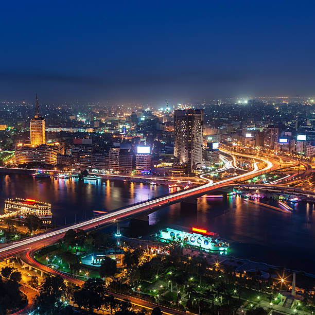 City skyline - Cairo at dusk aerial view A cityscape of the downtown area of Cairo, capital city of Egypt - aerial view. egypt skyline stock pictures, royalty-free photos & images