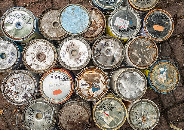 old cans of paint stock photo