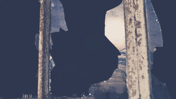 istock Broken glass at Window with mirror of sunlight 486824770