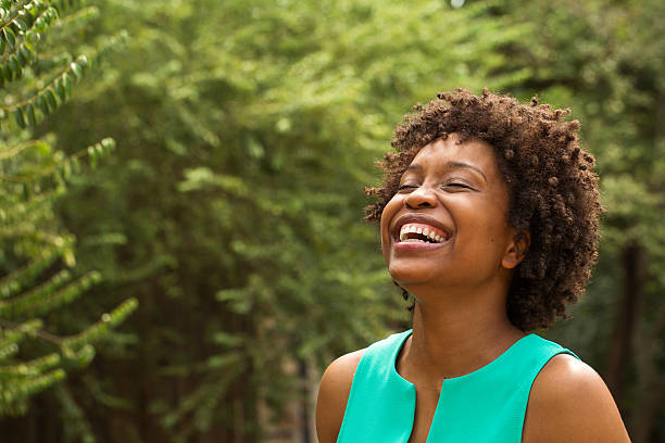 istock Excited woman laughing and smiling with copy space. 486825622