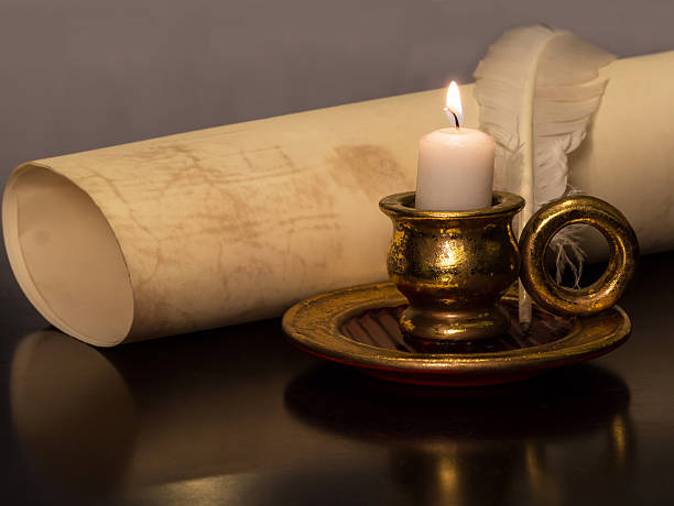 Antique Candle with a feather and parchment Antique Candle with a feather and parchment charles dickens stock pictures, royalty-free photos & images